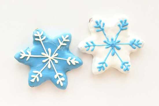 2 blue and white snowflake dog treats